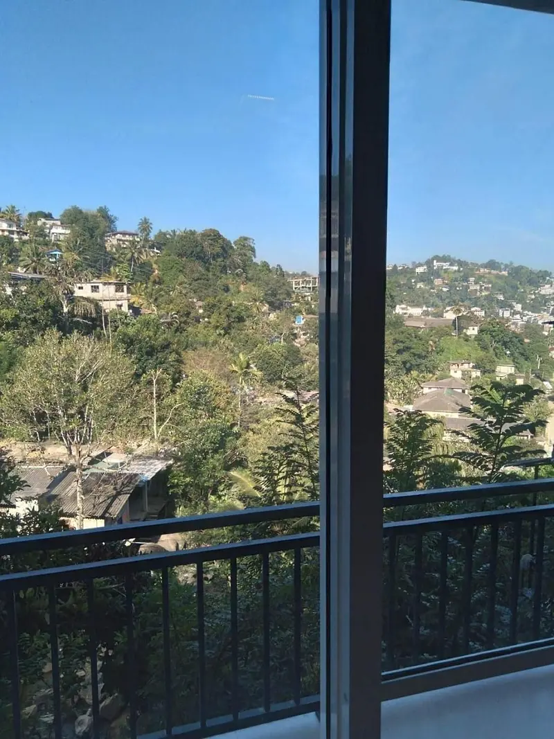 Window looking out to the hills from a room