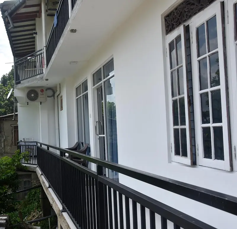 Upper floor balcony running past the rooms